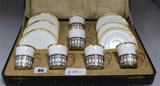 A boxed Shelley coffee set of silver cup holders